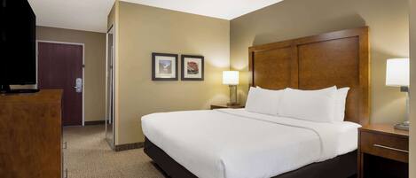 Down comforters, pillowtop beds, in-room safe, desk