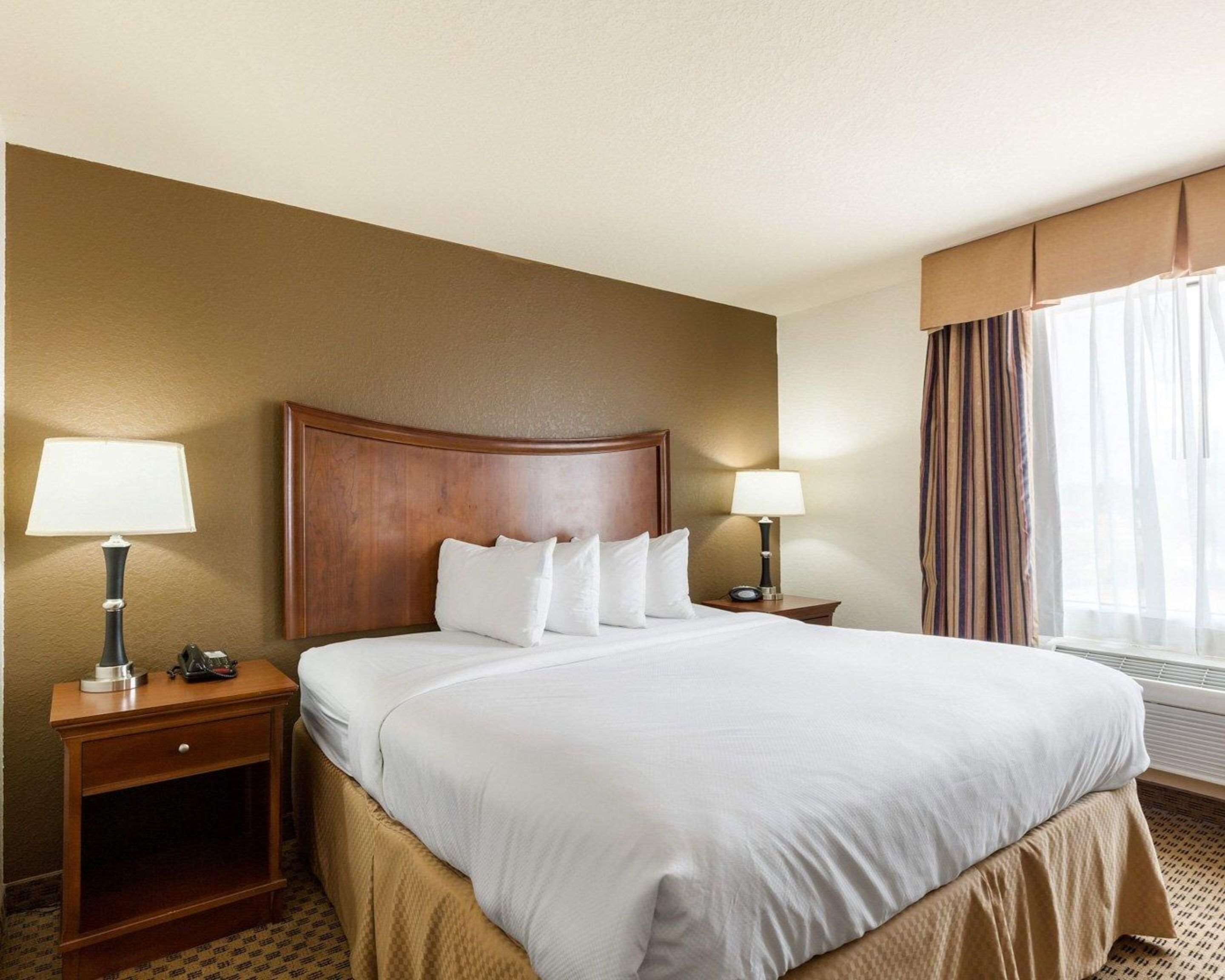Suite, 1 King Bed, Non Smoking | Desk, blackout drapes, iron/ironing board, free cribs/infant beds