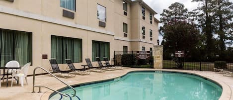 Outdoor pool, open 2:00 PM to 6:00 PM, pool umbrellas, pool loungers