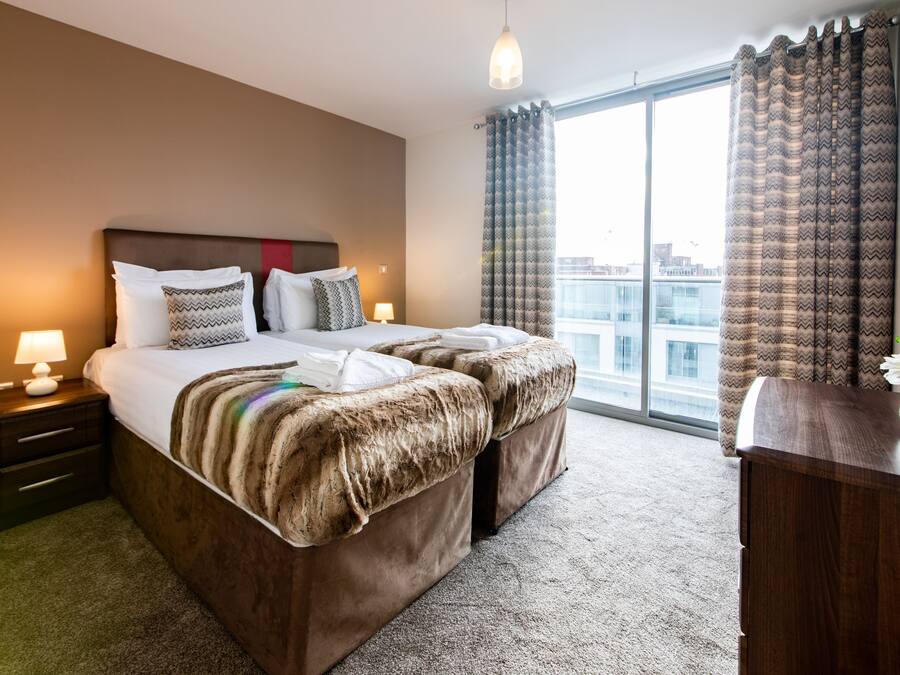 Hypo-allergenic bedding, in-room safe, iron/ironing board, travel crib