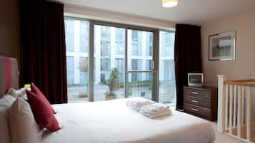 Apartment, 2 Bedrooms | Hypo-allergenic bedding, in-room safe, iron/ironing board, free WiFi