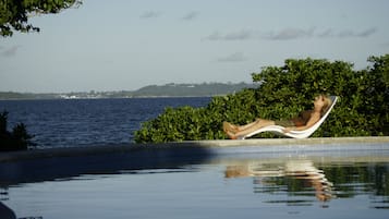 Outdoor pool, pool umbrellas, sun loungers