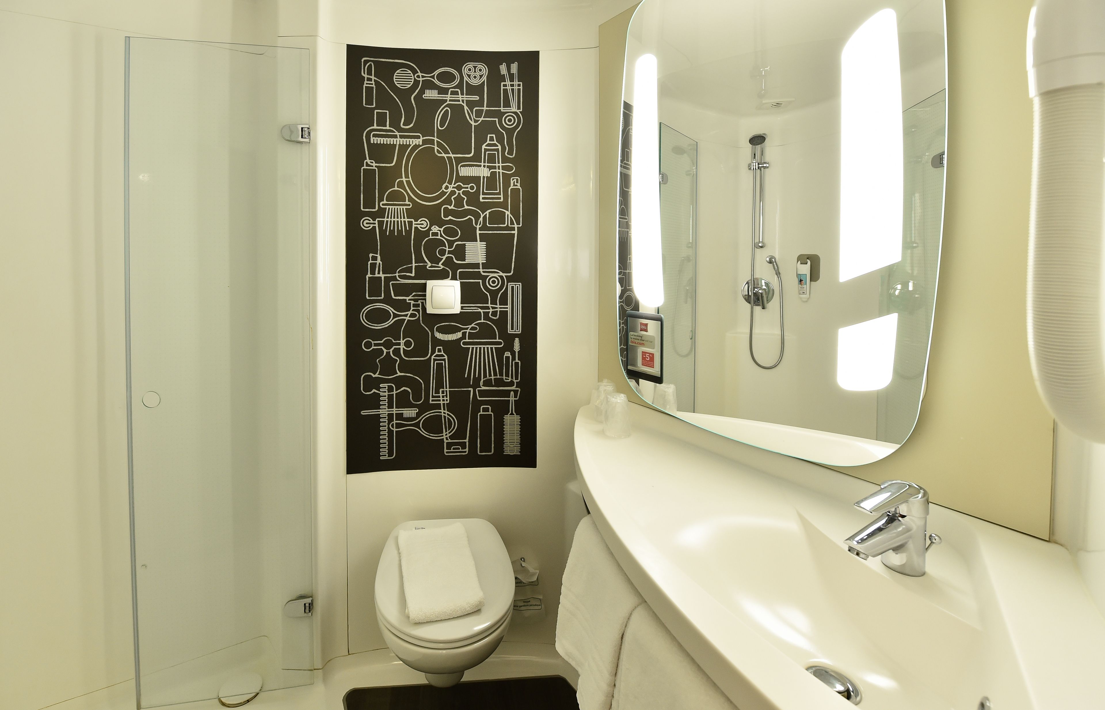 shower, eco-friendly toiletries, hair dryer, towels