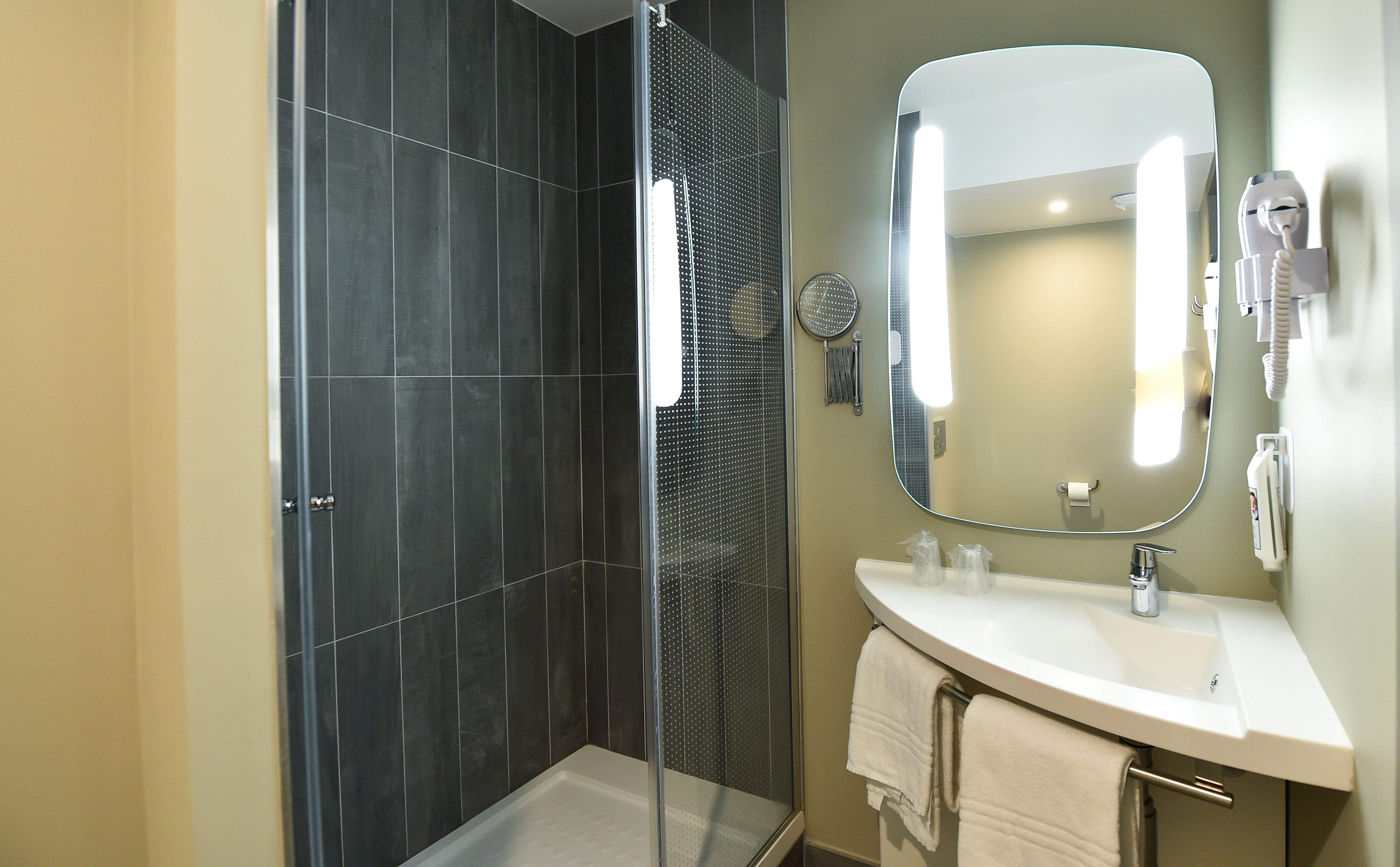 shower, eco-friendly toiletries, hair dryer, towels