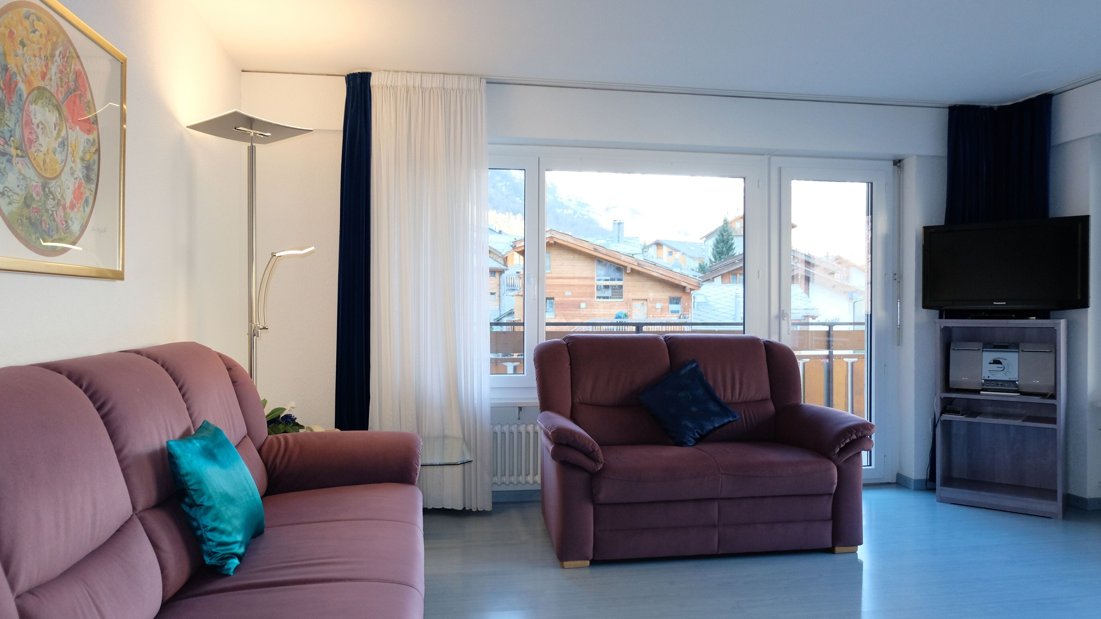 comfort apartment, balcony (4 beds) | living area | 80-cm flat-screen tv with cable channels, tv