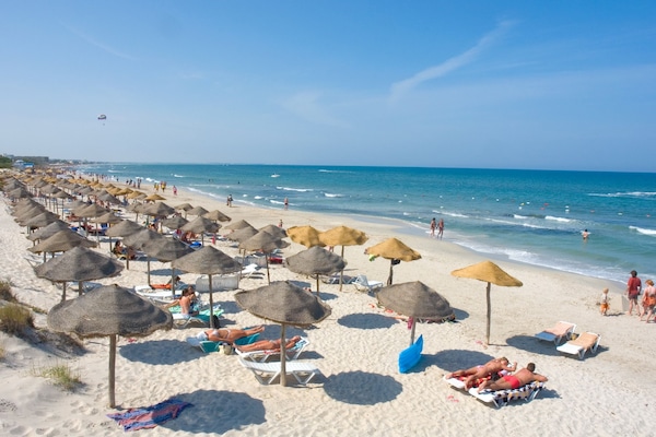 Private beach, white sand, sun loungers, beach umbrellas