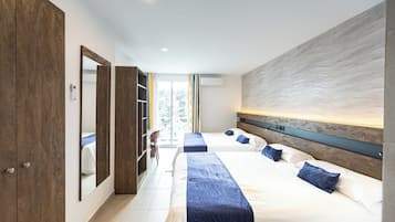 Quarto conforto, vista para o mar | Cofres nos quartos, escrivaninha, Wi-Fi de cortesia, roupa de cama