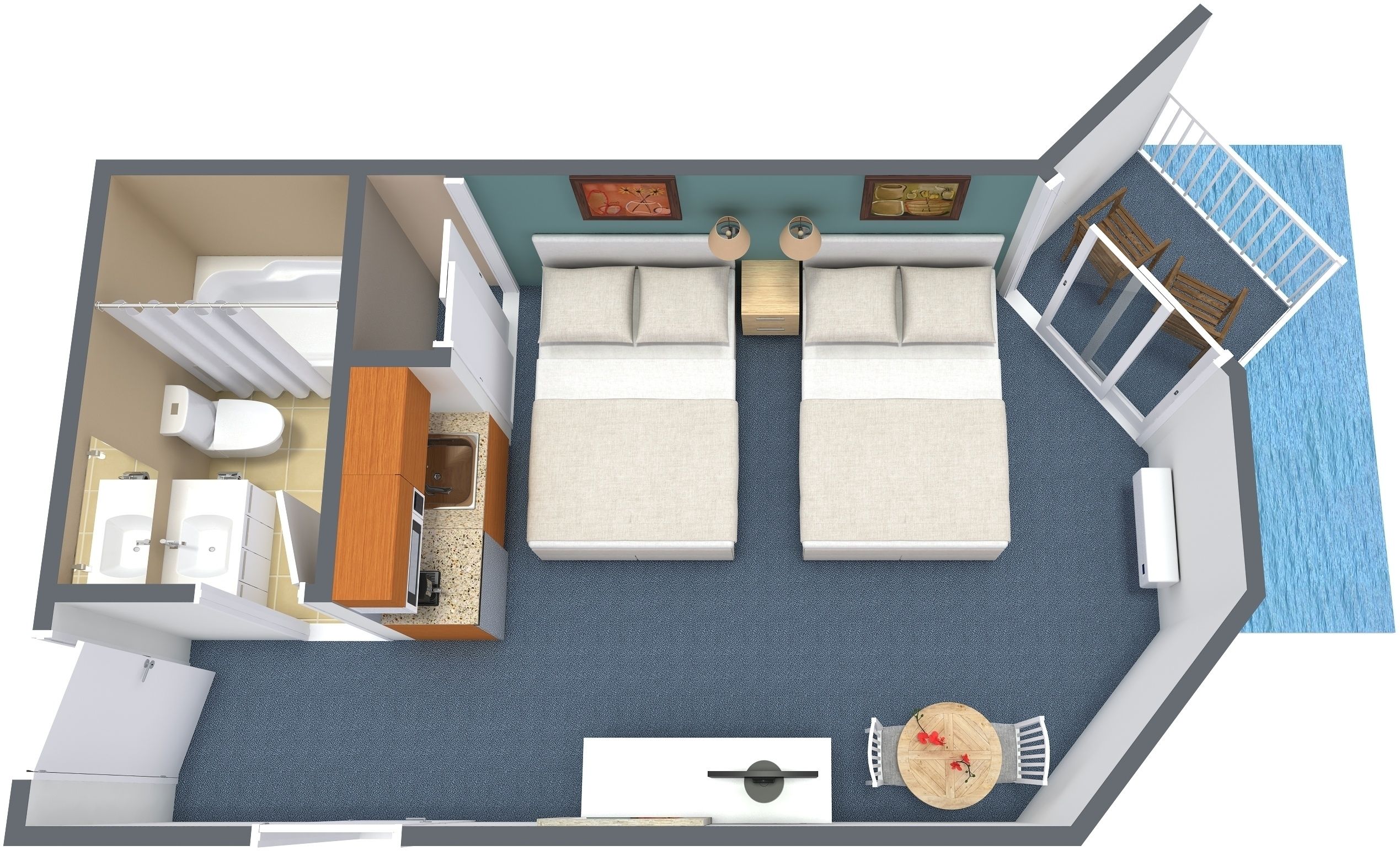 A hotel room with a bed, a small desk, a chair, a table, a sink, and a window with a view of the sea.