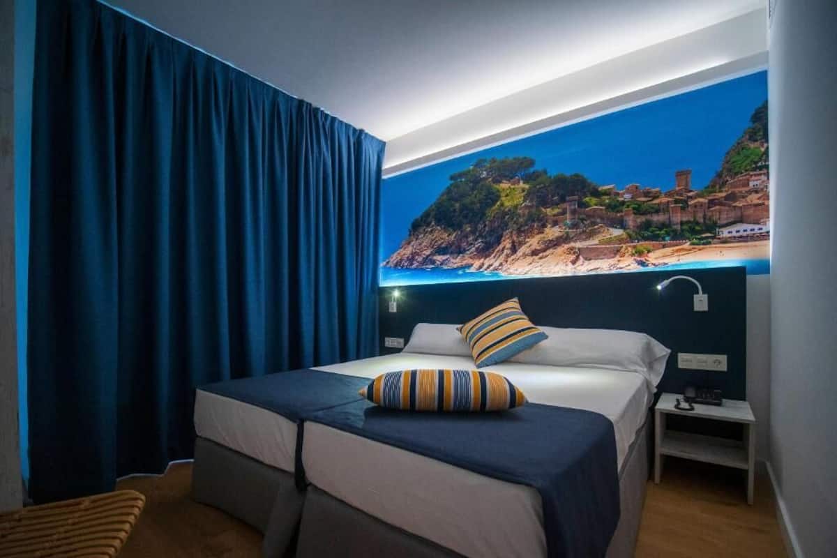 Desk, laptop workspace, cribs (free), WiFi (free)