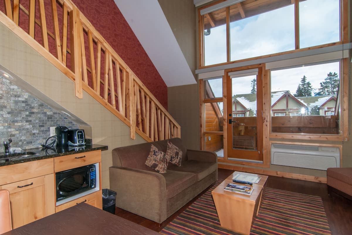 premium loft, 1 bedroom | 1 bedroom, premium bedding, in-room safe, blackout curtains