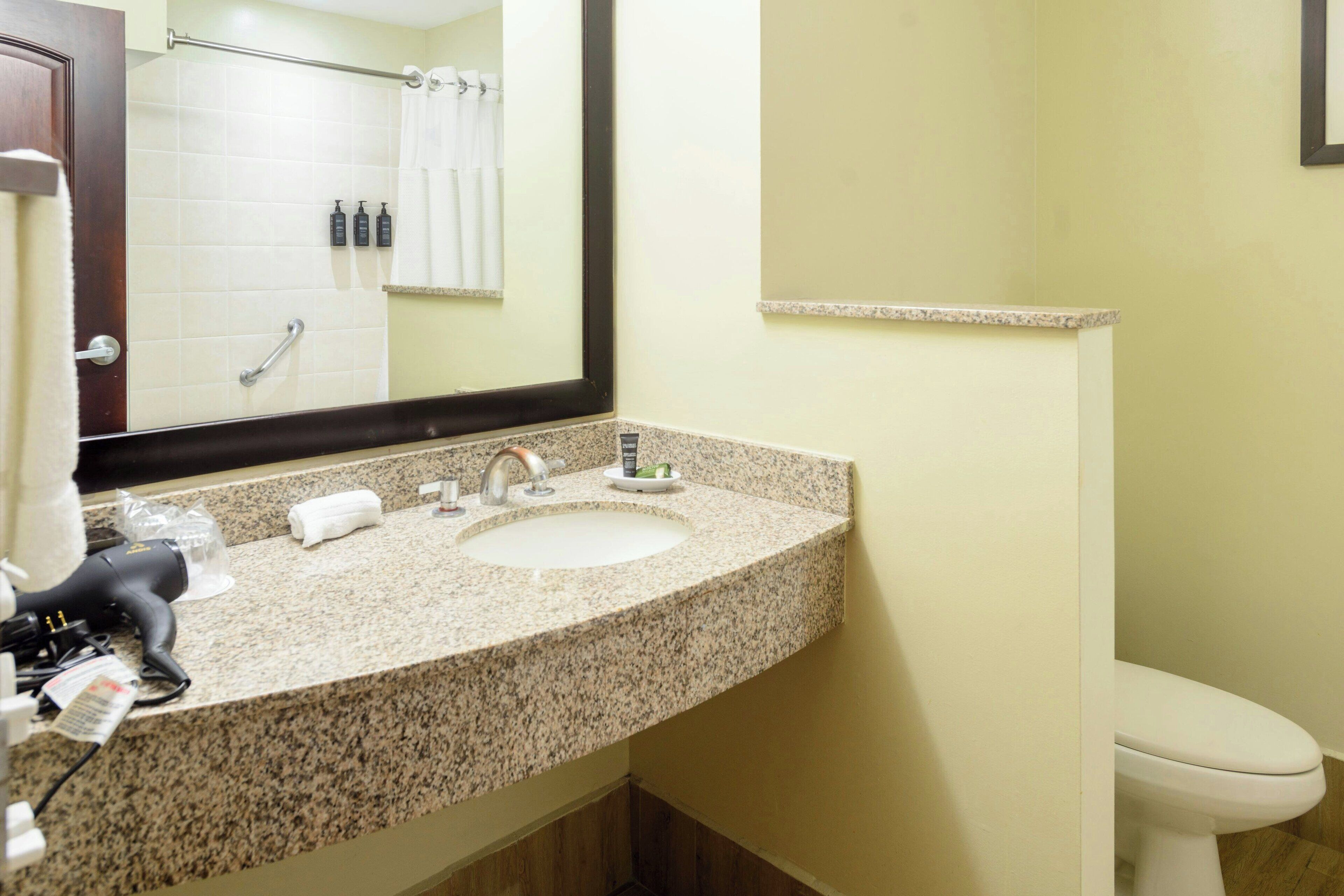 deep-soaking bathtub, free toiletries, hair dryer, towels