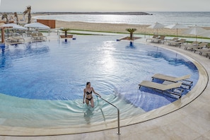 Indoor pool, open 8:00 AM to 8:00 PM, pool umbrellas, sun loungers