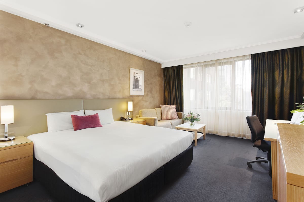 Premium Room, 1 King Bed | 1 bedroom, in-room safe, desk, laptop workspace