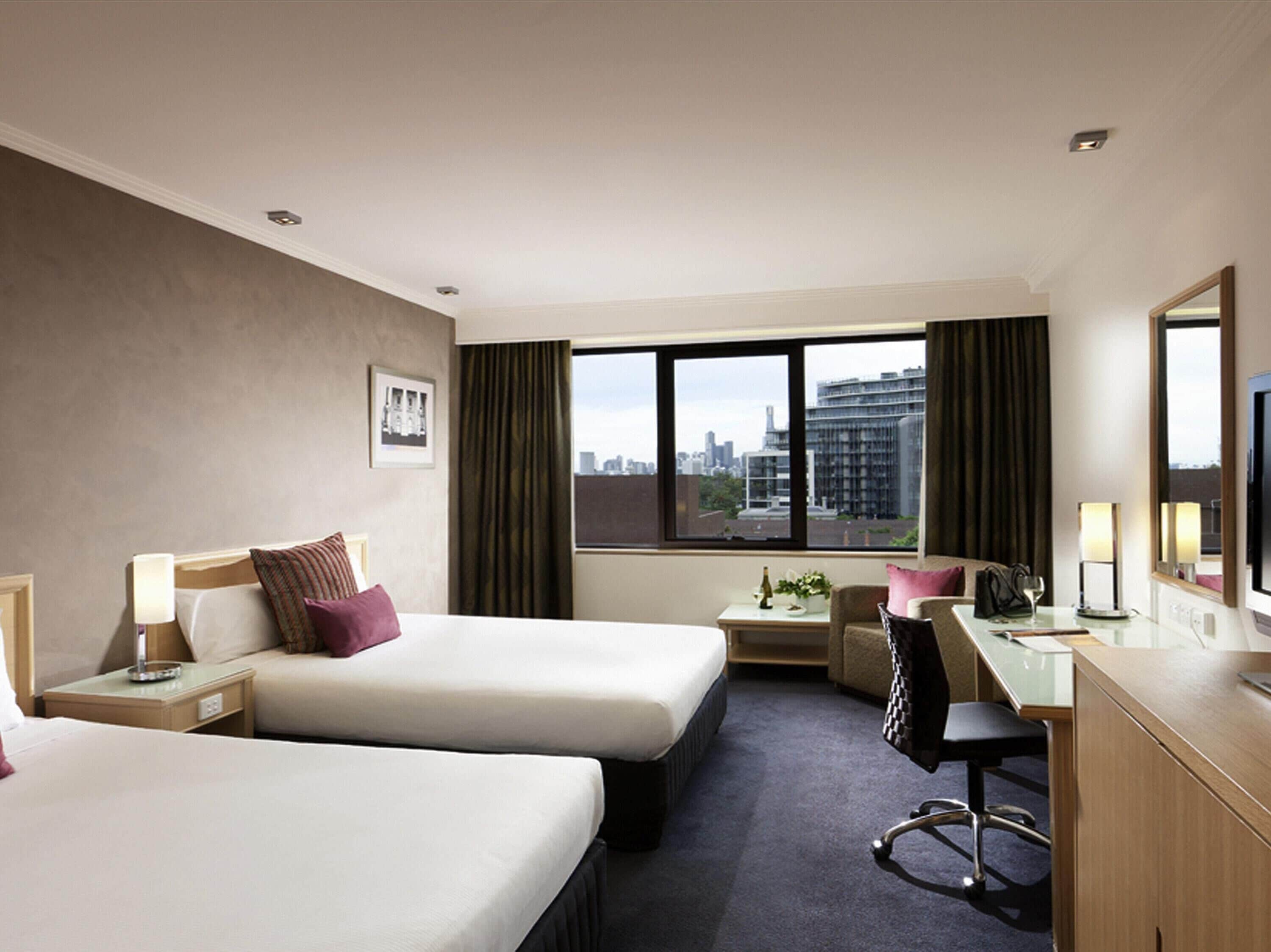 Premium Room, 2 Queen Beds | In-room safe, desk, laptop workspace, blackout drapes