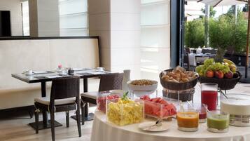Daily buffet breakfast (EUR 14 per person)