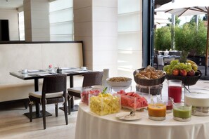Daily buffet breakfast (EUR 14 per person)