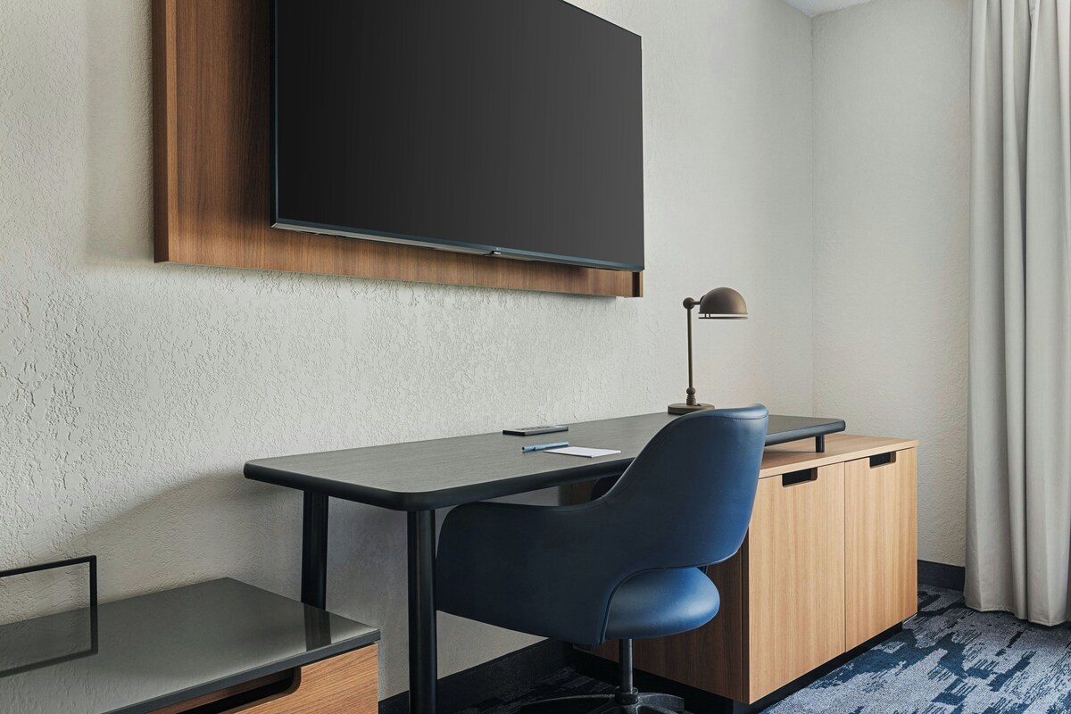 Premium bedding, pillow-top beds, desk, laptop workspace