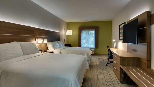 A hotel room with two beds, a desk, a chair, a TV, and a window. - Holiday Inn Express Hotel & Suites Austell - Powder Springs by IHG (Austell)