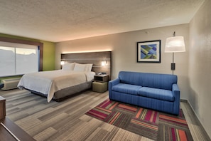 Suite, 1 King Bed | Desk, laptop workspace, blackout drapes, iron/ironing board