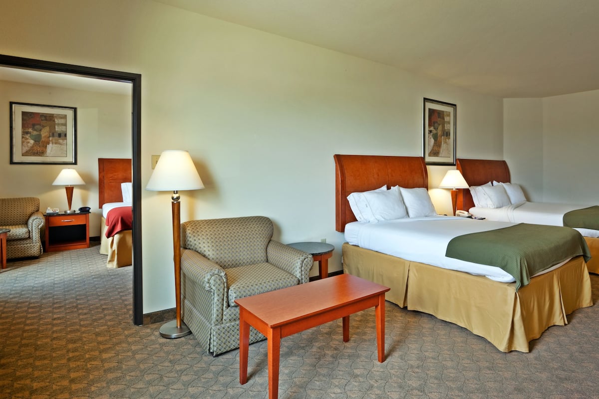 Premium bedding, desk, laptop workspace, soundproofing