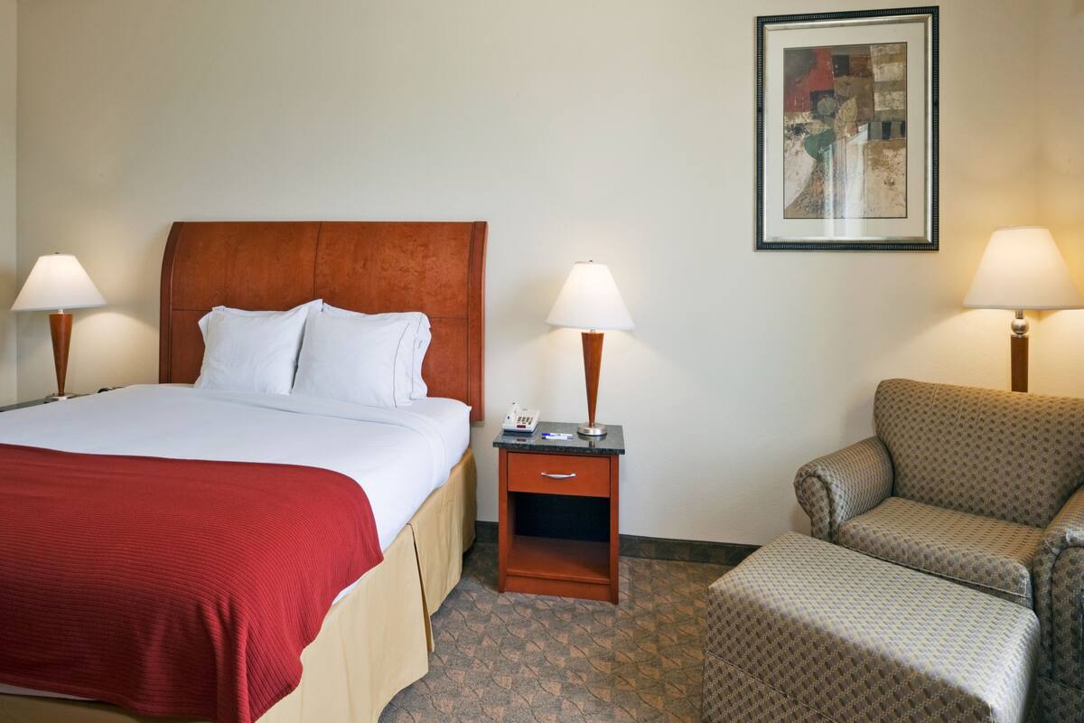 Premium bedding, desk, laptop workspace, soundproofing
