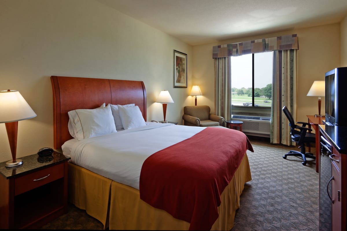 Premium bedding, desk, laptop workspace, soundproofing