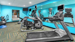 A gym with treadmills, elliptical machines, and exercise balls. - Holiday Inn Express & Suites Morristown by IHG (Morristown)