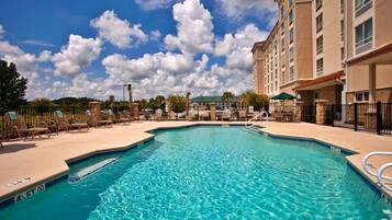 Outdoor pool, open 9:00 AM to 10:00 PM, pool loungers