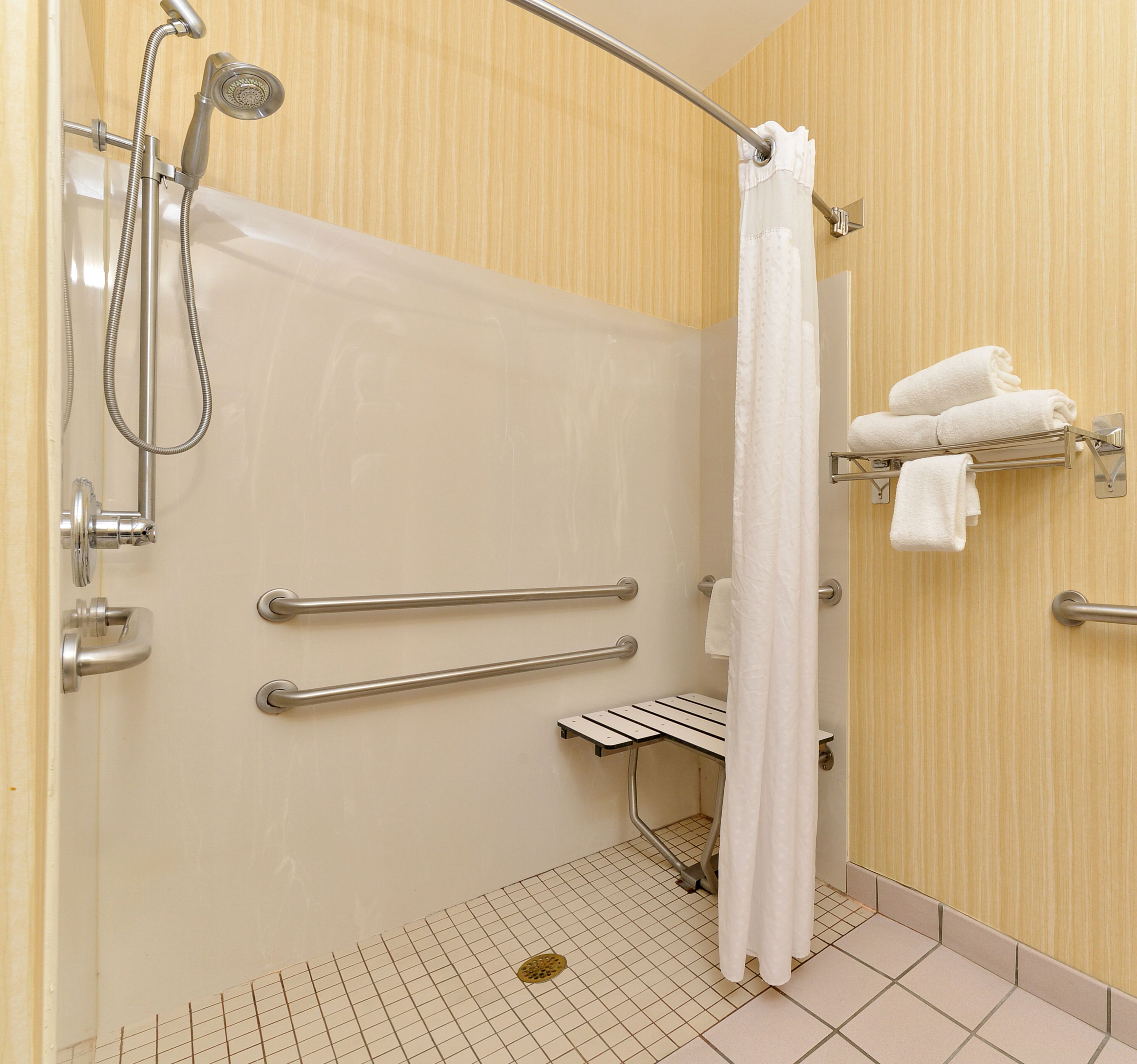 combined shower/bathtub, free toiletries, hair dryer, towels