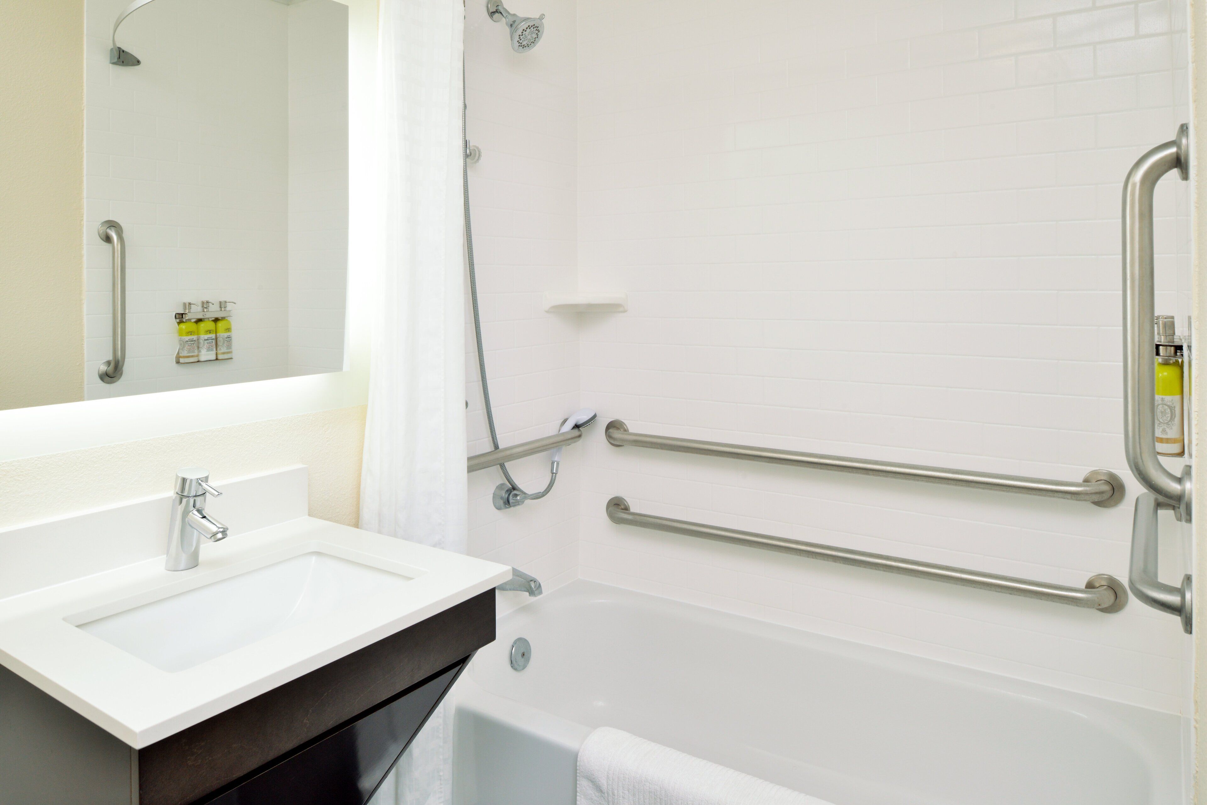 studio suite, 1 king bed, accessible (mobil access tub) | bathroom | combined shower/bathtub, free toiletries, hair dryer, towels