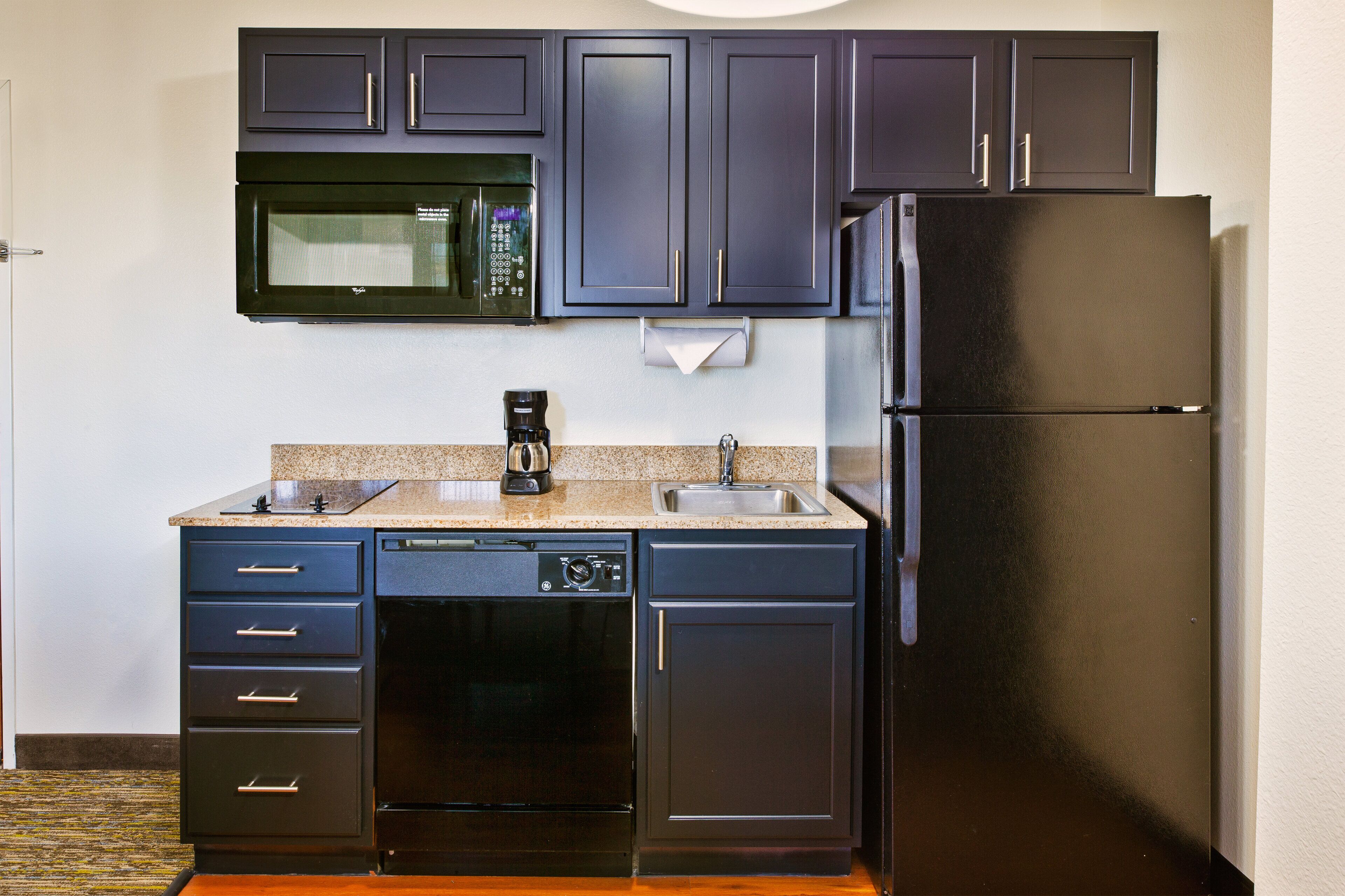 fridge, microwave, stovetop, coffee/tea maker