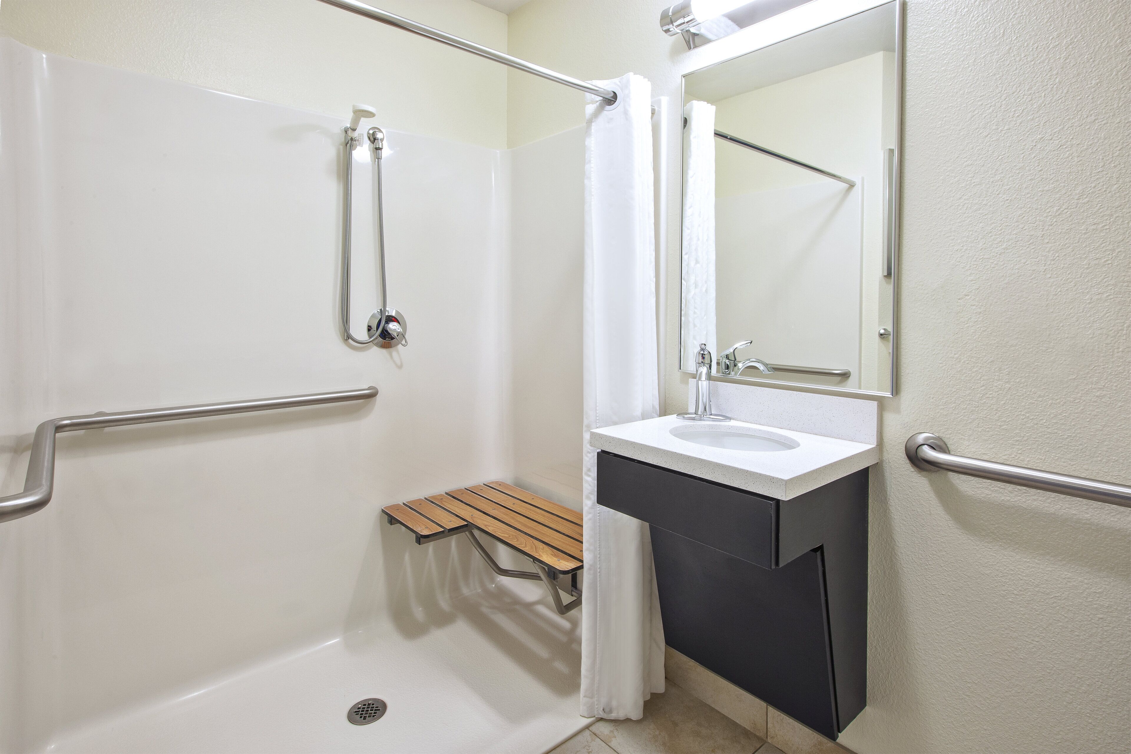combined shower/bathtub, free toiletries, hair dryer, towels