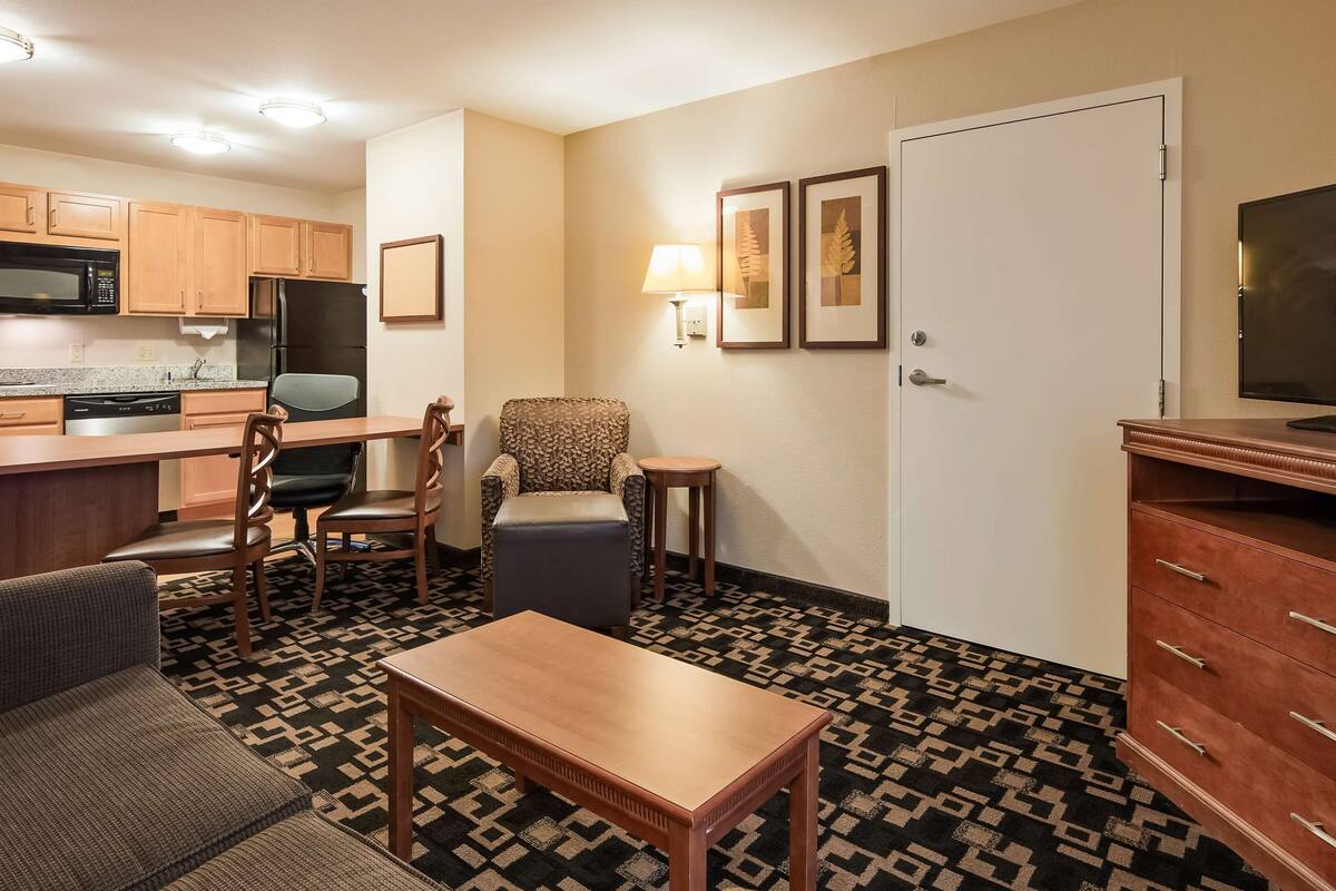 desk, laptop workspace, blackout curtains, iron/ironing board