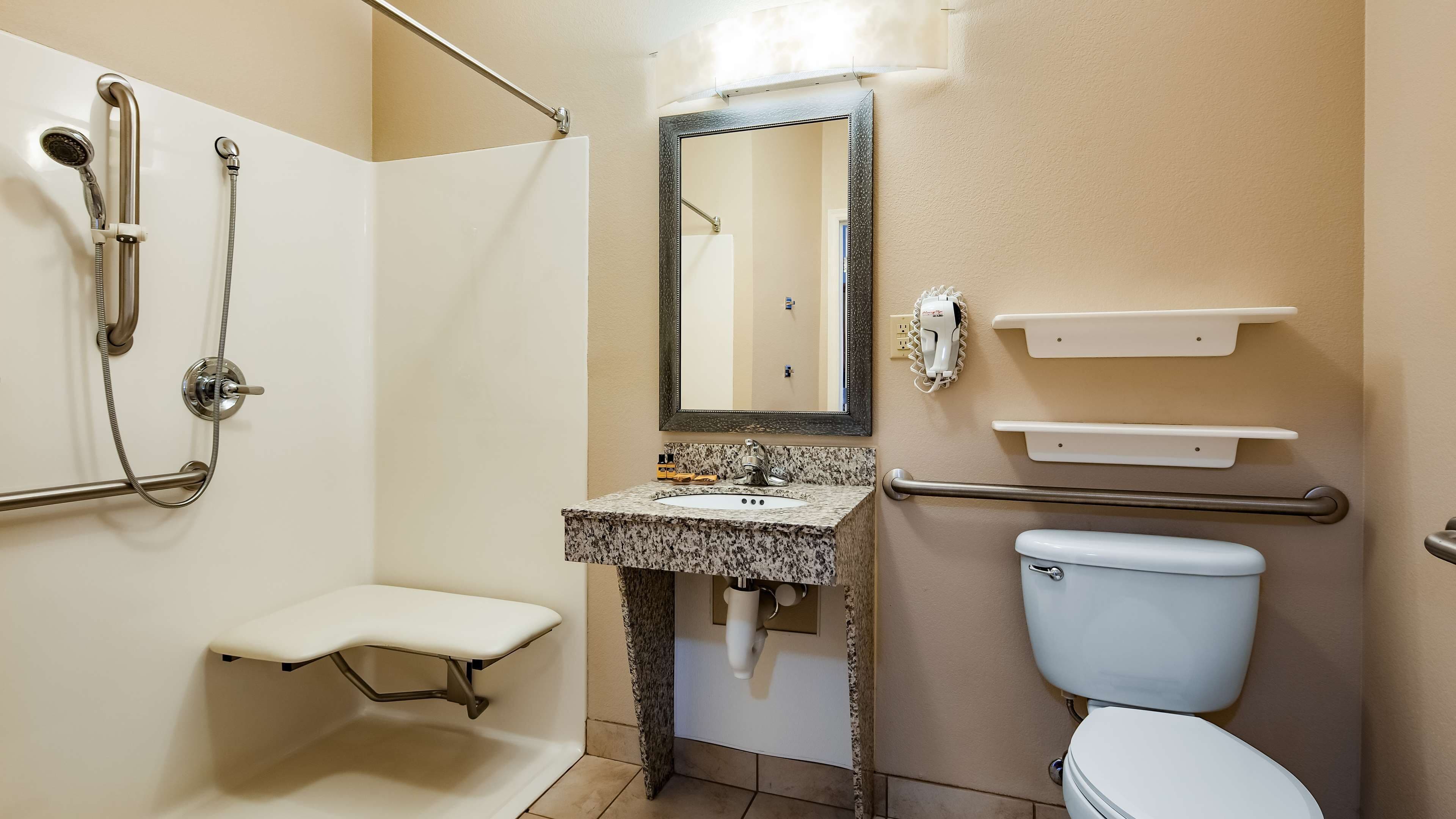 standard room, 2 queen beds, accessible, kitchenette | bathroom | combined shower/bathtub, free toiletries, hair dryer, towels