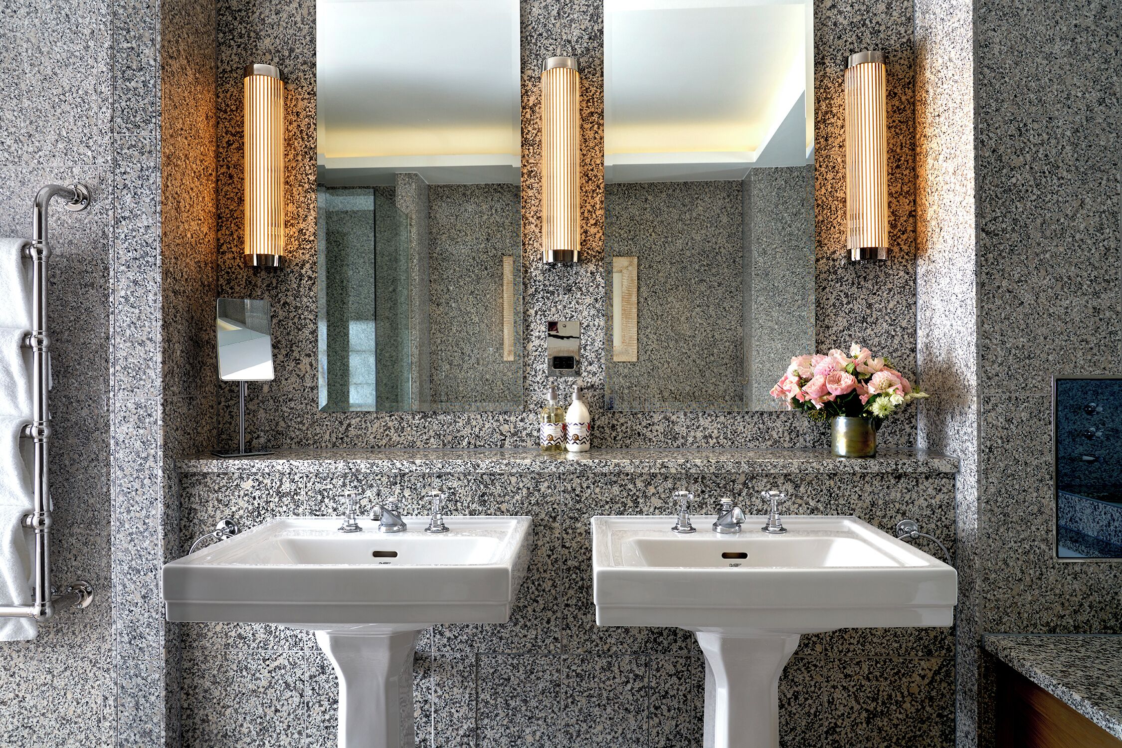 designer toiletries, hair dryer, bathrobes, slippers