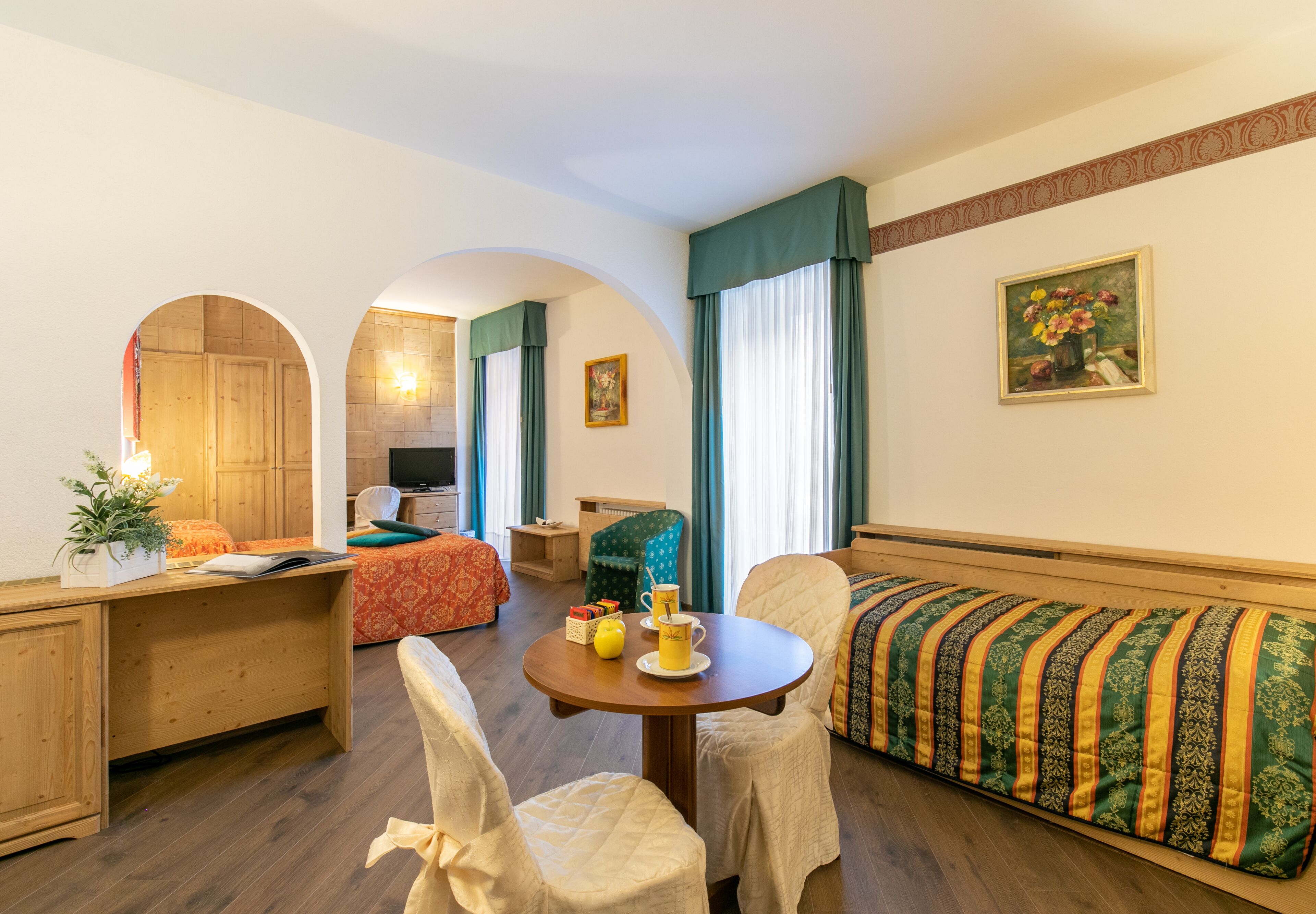 superior quadruple room, mountain view | minibar, in-room safe, desk, cots/infant beds