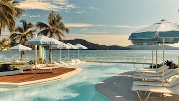 4 outdoor pools, pool umbrellas, pool loungers