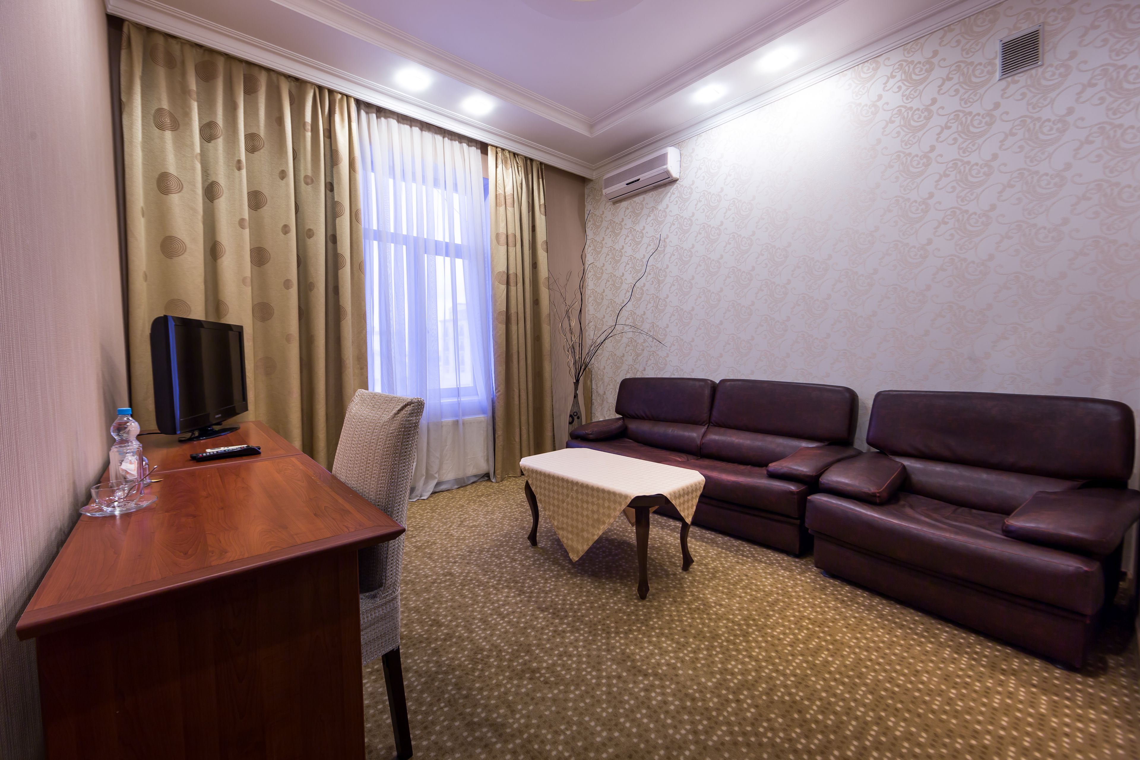 premier suite | living area | 82-cm led tv with cable channels, tv