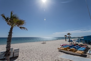 Private beach, sun-loungers, beach umbrellas, windsurfing