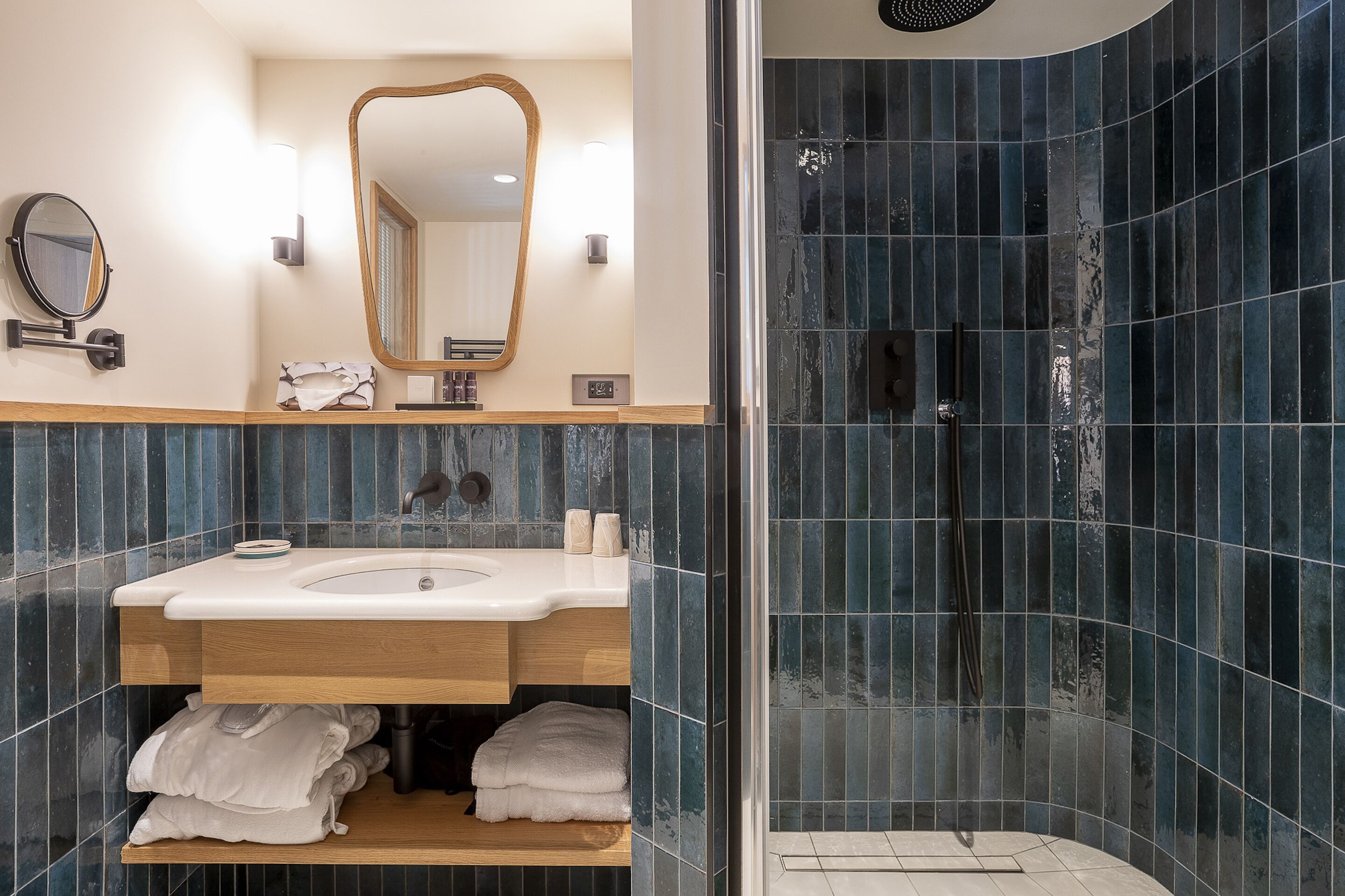 duplex | bathroom | rainfall showerhead, designer toiletries, hair dryer, bathrobes