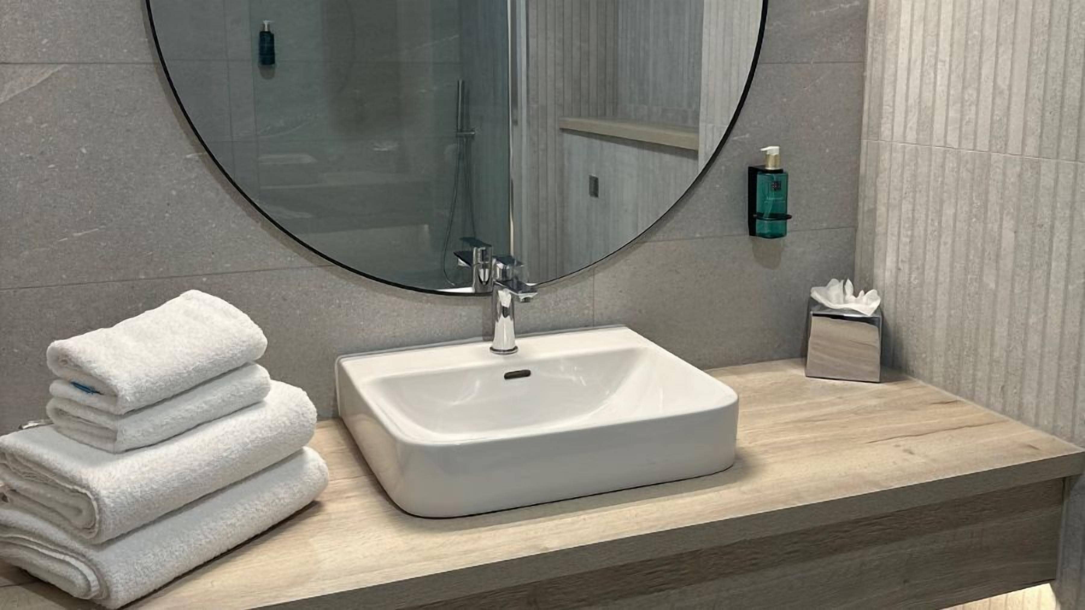 junior room, 1 king bed | bathroom | free toiletries, hair dryer, soap, shampoo