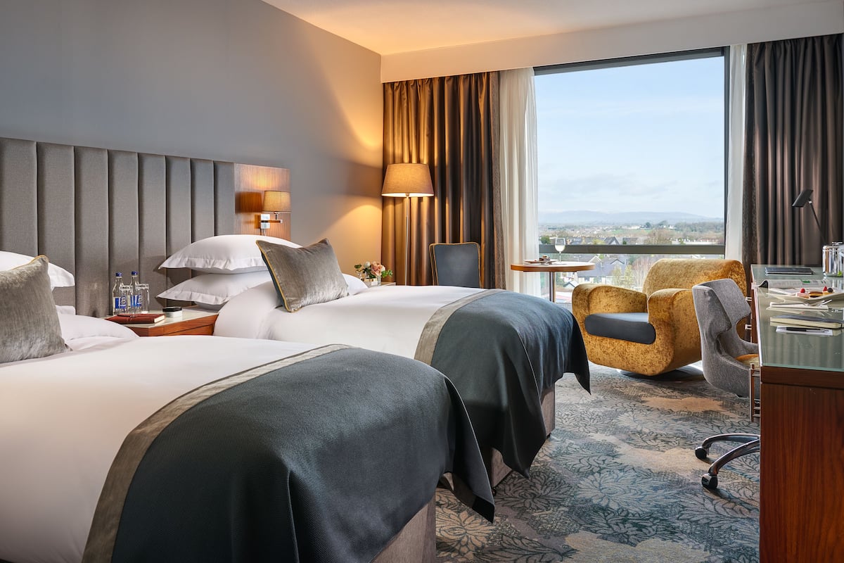 hypo-allergenic bedding, in-room safe, desk, blackout curtains