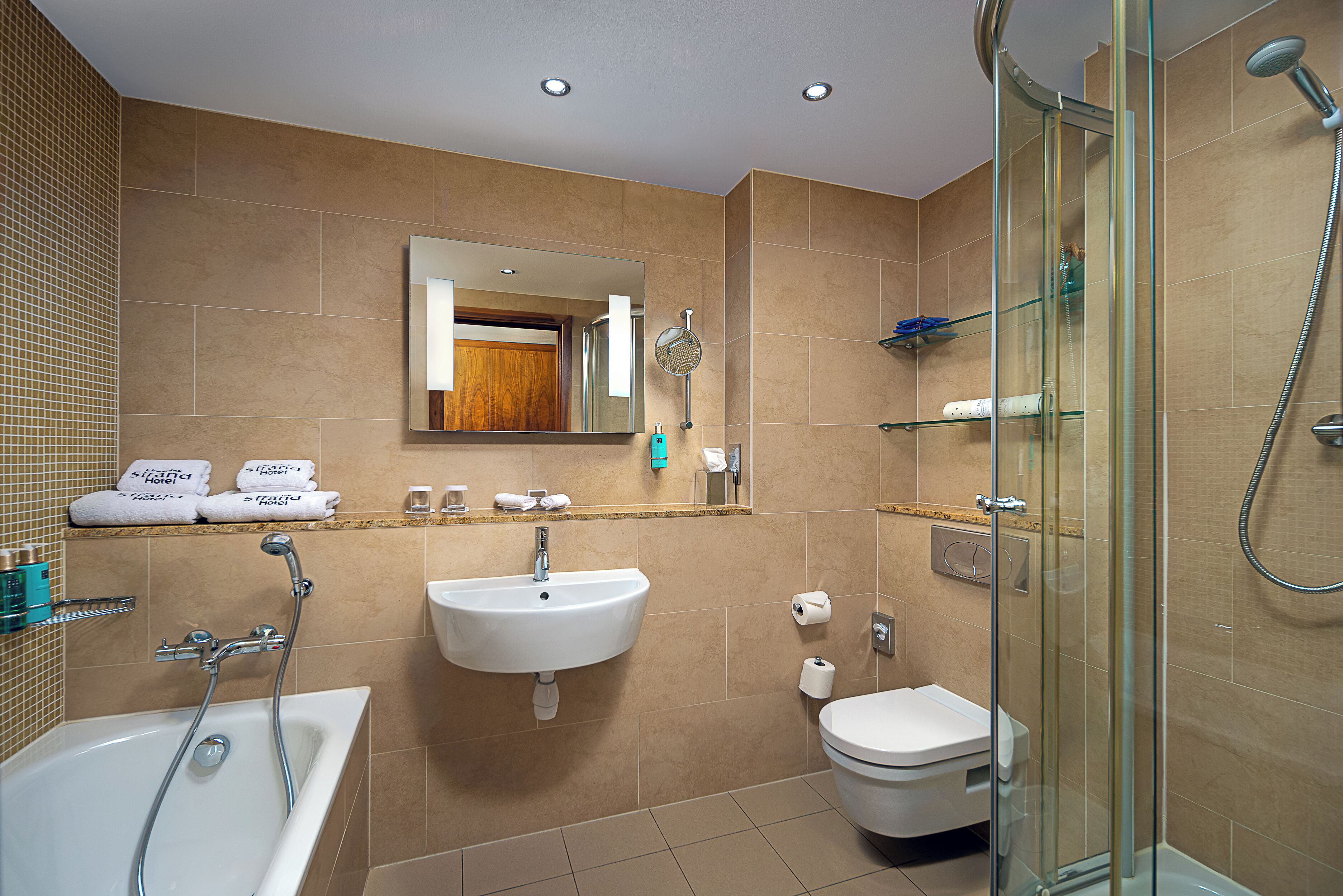 separate bathtub and shower, free toiletries, hair dryer, bathrobes