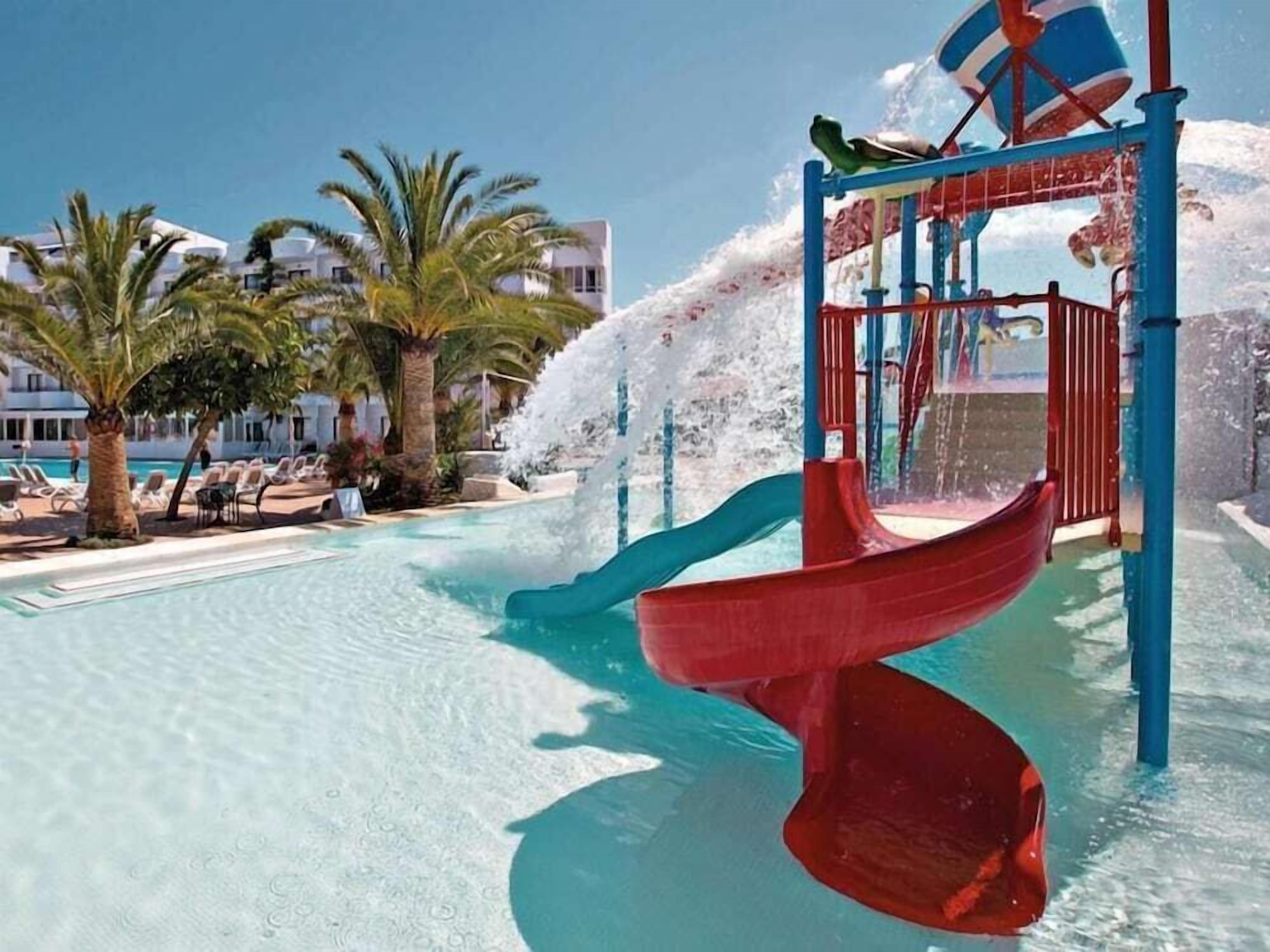 3 outdoor pools, pool umbrellas