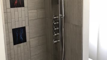 Deluxe Room, 2 Queen Beds | Bathroom | Shower, bathrobes, towels