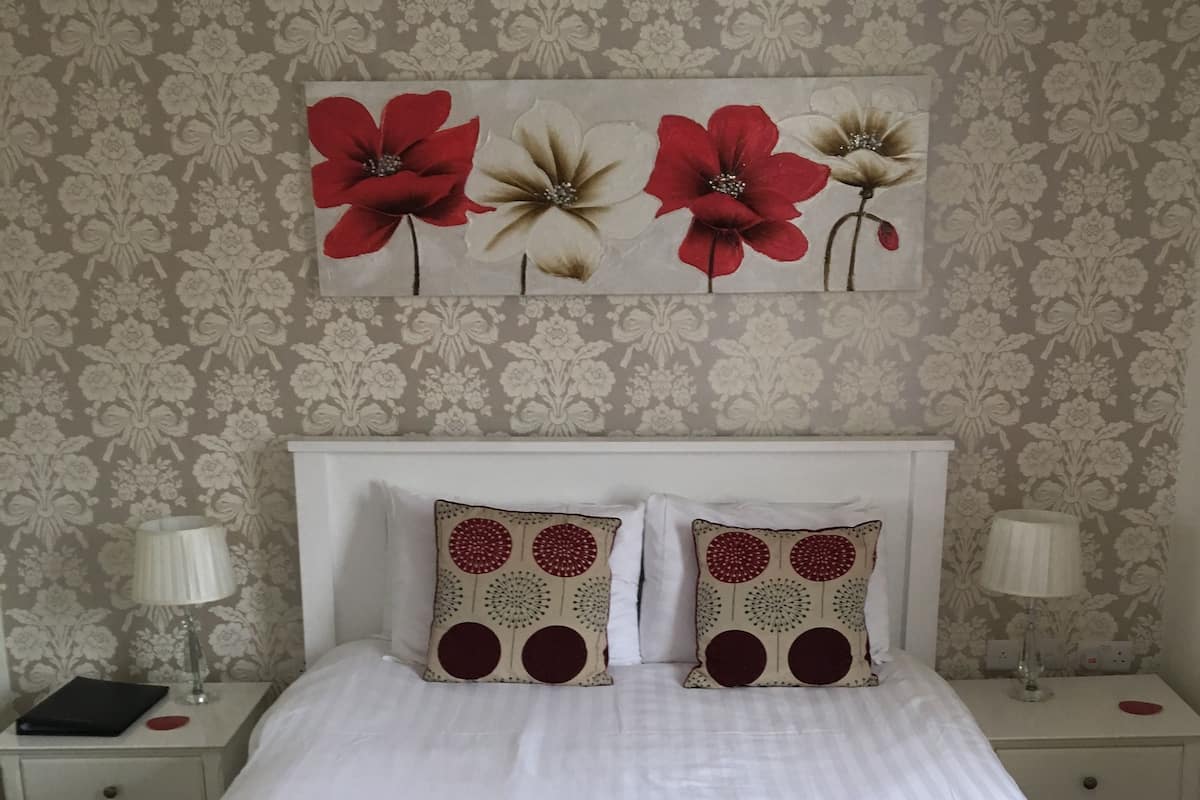 Iron/ironing board (on request), WiFi (free), bed sheets