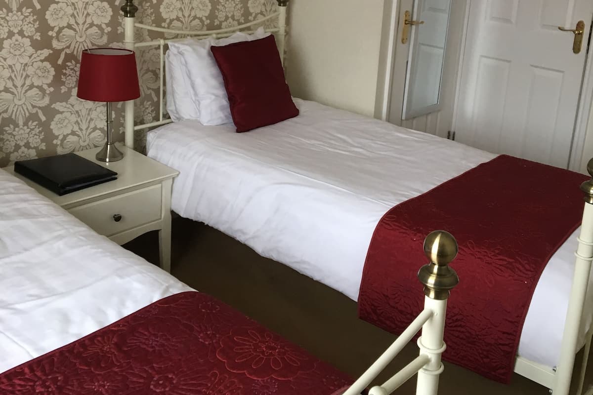 Iron/ironing board (on request), WiFi (free), bed sheets