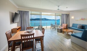 Deluxe Coral Sea View Apartment | Living area | TV, DVD player