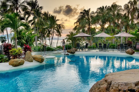 Outdoor pool, pool umbrellas, sun loungers