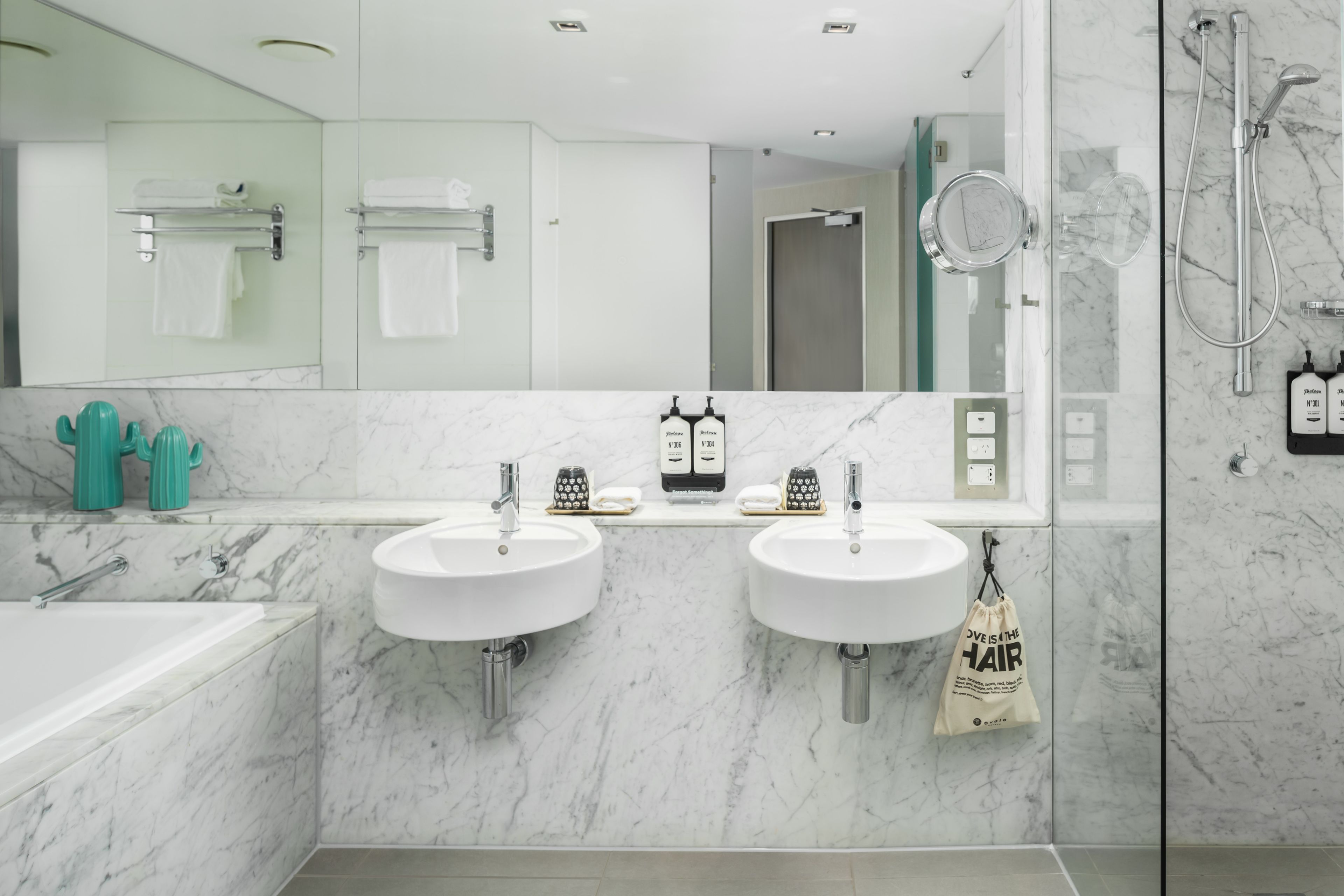 large spa | bathroom | eco-friendly toiletries, hair dryer, bathrobes, slippers